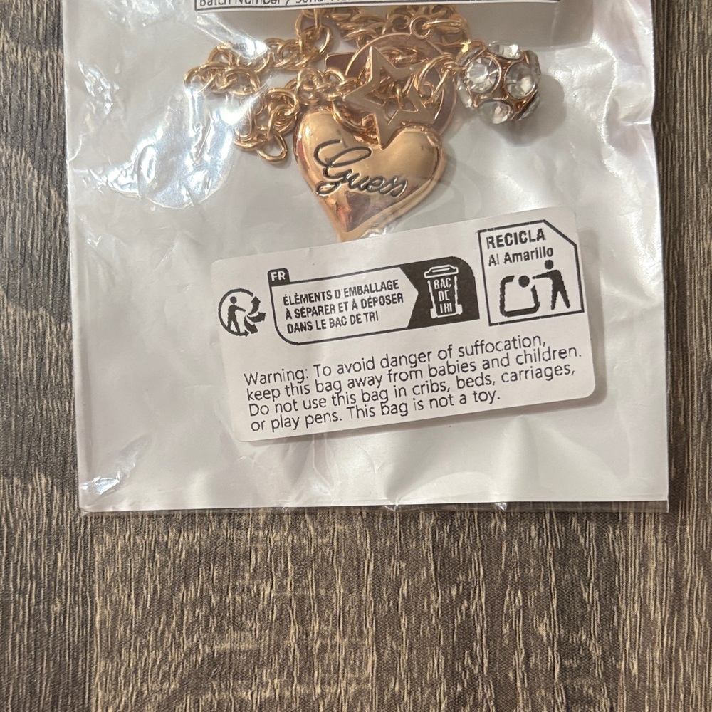 Guess Gold accent Heart Pendant bracelet